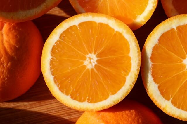 Sliced orange showing natural symmetry, colour and pattern as a reminder to notice the beauty of nature.