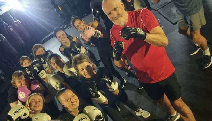 Group exercising together to promote Brain Health & Exercise for improved memory and focus.