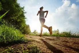 Person running outdoors, demonstrating why staying active protects both body and mind in vibrant nature.