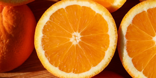 Sliced orange showing natural symmetry, colour and pattern as a reminder to notice the beauty of nature.