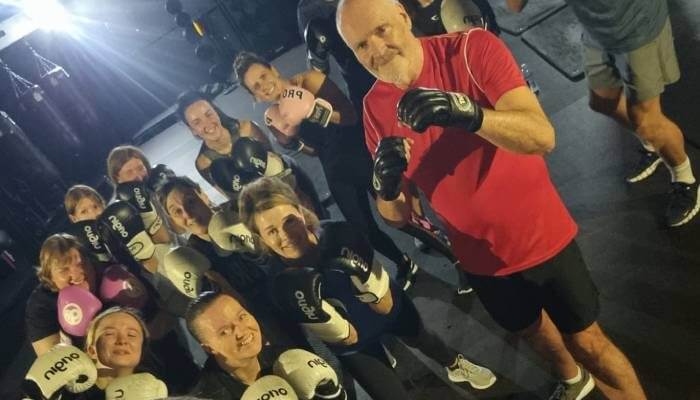 Group exercising together to promote Brain Health & Exercise for improved memory and focus.