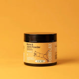 Fourflax Feline Bone & Joint Powder jar on a yellow background