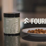 Fourflax flex seed flake container on a table with a blurred background