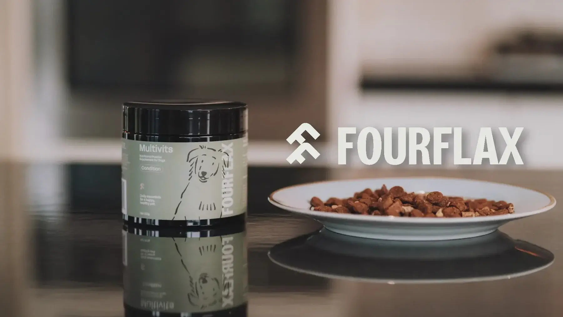Fourflax multivitamin container on a kitchen counter with a blurred background