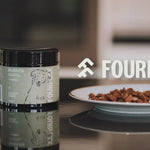 Fourflax multivitamin container on a kitchen counter with a blurred background