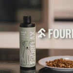 Bottle of FourFlax pet supplement on a kitchen counter with 'FourFlax' branding.