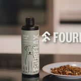 Bottle of FourFlax pet supplement on a kitchen counter with 'FourFlax' branding.