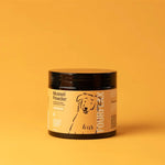 Jar of mussel powder with a label on an orange background