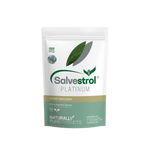 A white stand-up pouch of Salvestrol Platinum dietary supplement, featuring green leaf graphics and a gold and teal band near the bottom, centered on a pale green background.