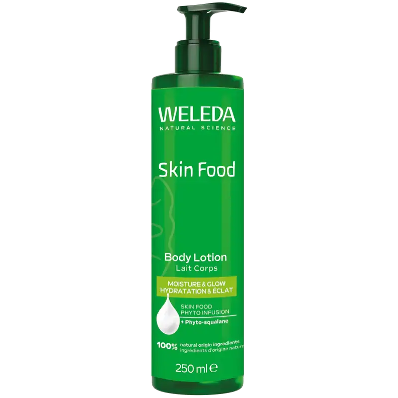 Green bottle of Weleda Skin Food Body Lotion on a white background